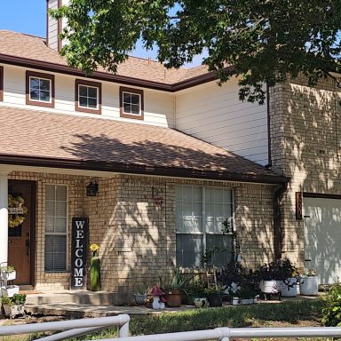 A sprayed paint finish on a house A house with a sprayed finish and two coats of paint